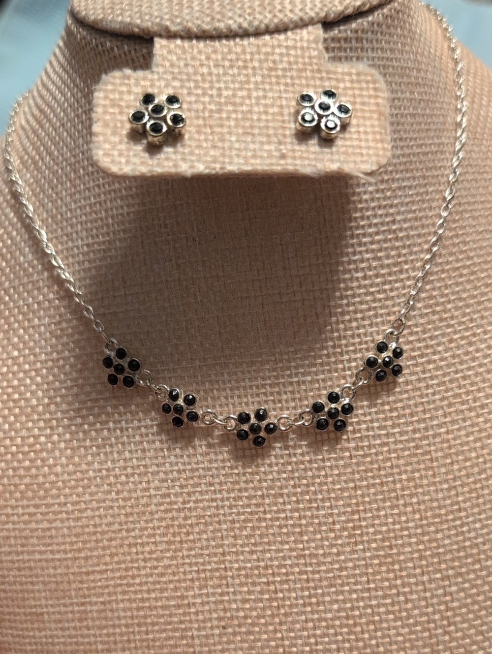 Silver Floral Cluster Necklace and Earring Set with Black Accents